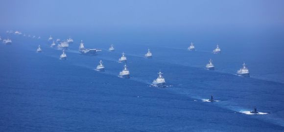 Chinese President Xi Jinping reviews naval parade in South China Sea